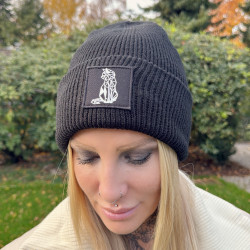Lara CumKitten pairing Cat Beanie Black Desire with white jacket – casual & classy