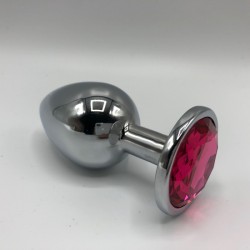 Worn metal anal plug